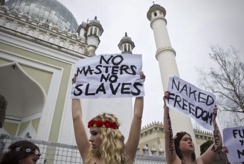 Nude Women infront of Mosque